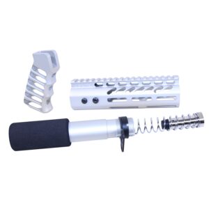 AR-308 pistol accessory set featuring stabilizer, muzzle brake, and grip in clear anodized finish.