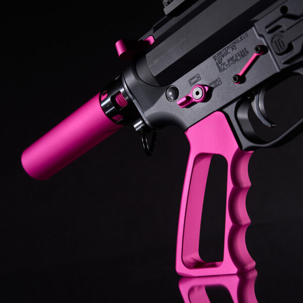 Close-up of a black and pink custom pistol grip and lower receiver.