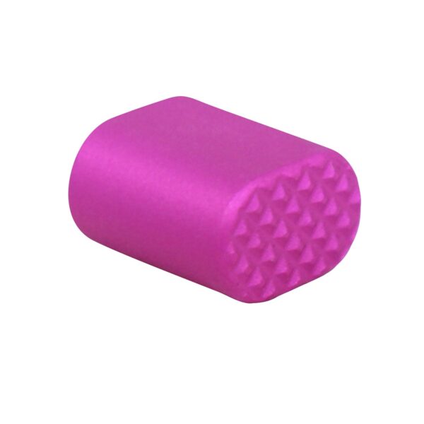 Magenta AR-15 extended magazine release button with textured pyramidal end.