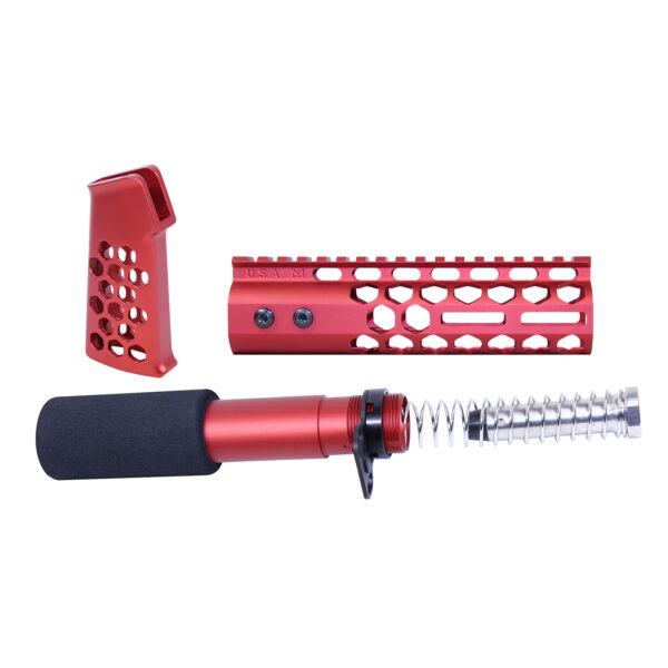 Red AR-15 honeycomb pistol grip and accessories set, featuring metallic and foam components.