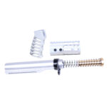AR-15 pistol brace kit components with buffer tube, spring, and spacers on white background.