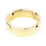 Gold-plated AR-15 castle nut with precise threading for secure buffer tube attachment.